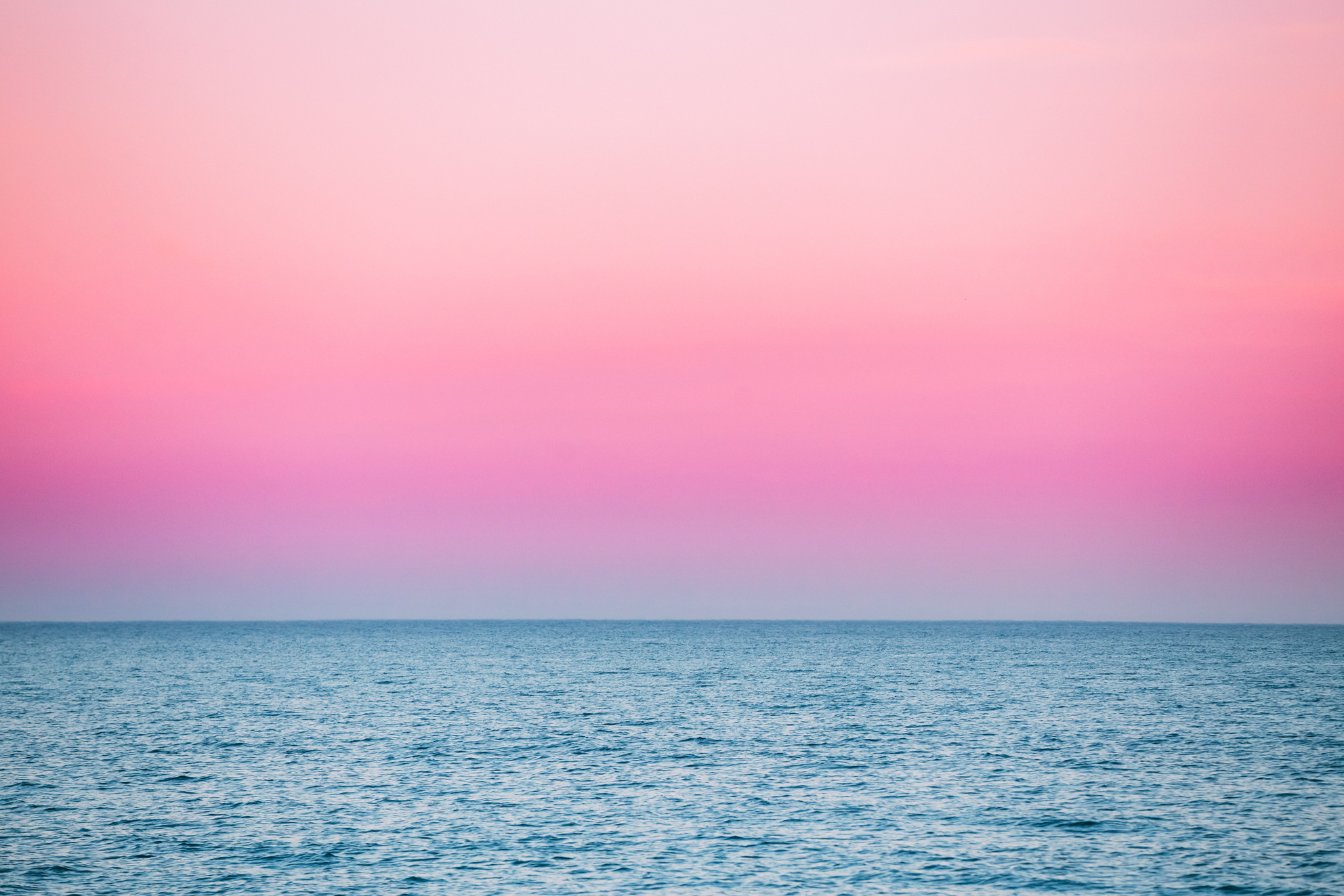 Calm Sea Ocean And Pink Sky Sunset Sunrise Background